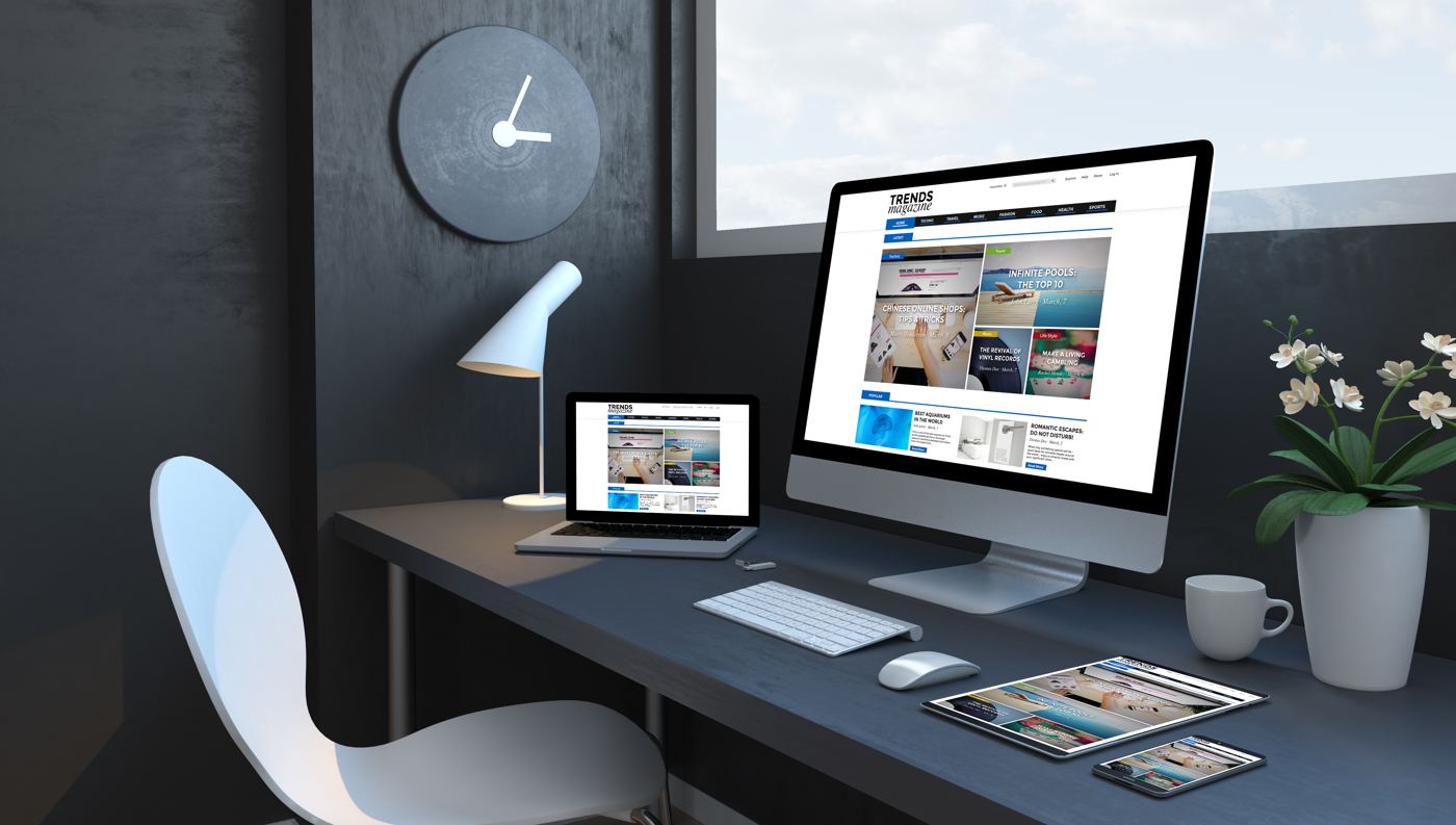 A responsive website shown on a desktop, laptop, tablet and phone